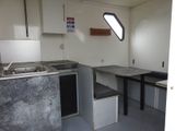 an image of a kitchen with a sink and a counter