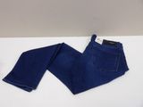 a pair of blue jeans on a white table