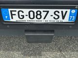 a license plate on the back of a car
