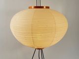a lamp that is sitting on a stand on a table