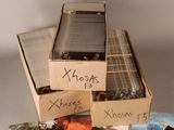 three boxes that are stacked on top of each other on a table