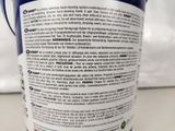 a close up of a can of soda on a table