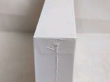 a close up of a white box on a table