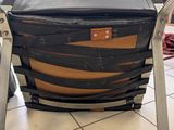 a suitcase that is sitting on a chair in a room