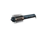 un gros plan d'une brosse à cheveux munie de picots