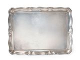 a silver tray with a decorative design on the edge