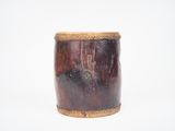 an image of a wooden container with a handle on a white background