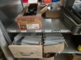 many boxes of items on the shelves in the store