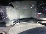 a close up of a car dashboard with a speedometer