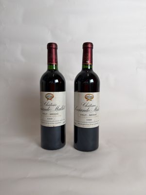 two bottles of red wine sitting next to each other on a white surface
