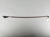 a close up of a pair of scissors hanging from a string