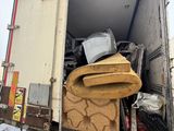 a truck that has a lot of stuff in the back of it