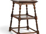 an old wooden table with a glass shelf on top of it