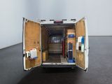 an image of a white van with its doors open