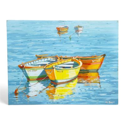 three boats that are sitting in the water