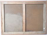 a picture of an old window that is missing the glass