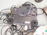 an image of a video game console and a game controller