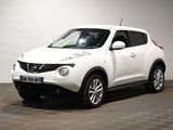 a picture of a white nissan juke suv