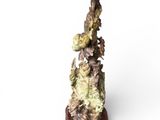 a figurine of a bird perched on top of a tree