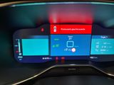 a close up of a car dashboard with a digital display