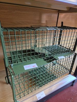 a cage that has a bunch of items inside of it