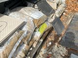 a truck that has a bunch of items in it