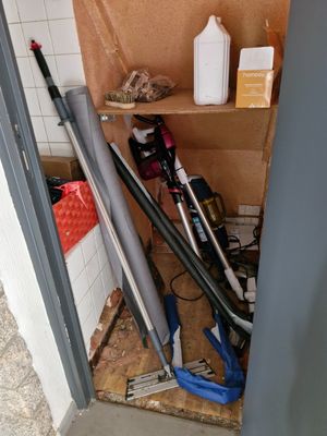 several baseball bats and baseball bats are sitting on a shelf