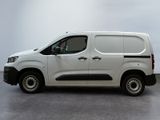 a picture of a white van parked in a room