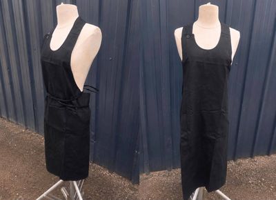 two mannequins that are on display in front of a blue wall