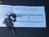 a book with a bunch of keys and a car key