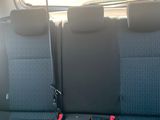 a seat in the back of a car that is empty