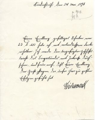 une lettre écrite à l'encre noire sur une feuille de papier