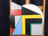 a picture of a wooden easel with a painting on it