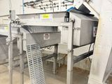an image of a conveyor belt in a factory