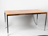 an image of a wooden table with metal legs on a white background