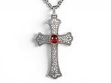 a close up of a cross with a red stone on it