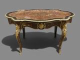 a table that has a marble top on it