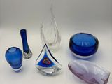 a lot of glass items that are on a table