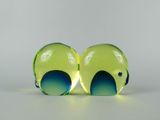 pair of yellow and blue glass hearts on a white surface