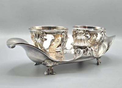 pair of silver plated candlestick holders with birds on them