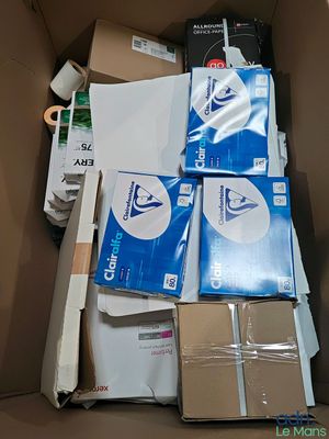 a cardboard box filled with many different types of items