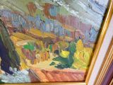 a picture of a painting of a landscape in a frame