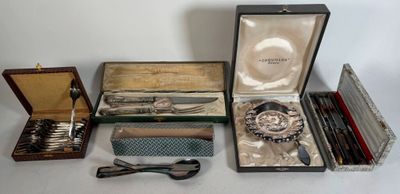 many different types of silverware in a case