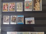 a lot of stamps on display in a case