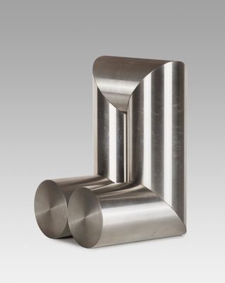 a close up of a metal object on a white background