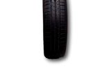 a close up of a tire on a white background