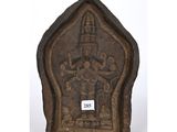 an old wooden plaque with a carving of a man and a woman