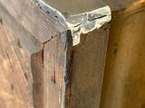 a close up of a piece of wood on a table