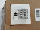 a box with a sticker on it sitting on a table