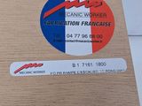 a cardboard box with a sticker on it and a sticker on it